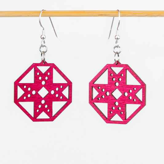 Kannuksenpyörä - korvakoru fuksia